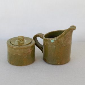 Vibrant green sugar pot and milk jug. Made by Jo Ceramics