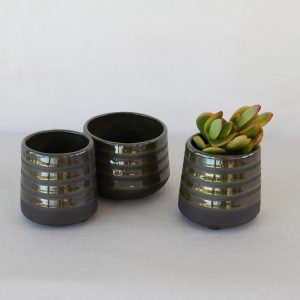 Glossy black small pots for succulents and small decorative plants. Made by Jo Ceramics