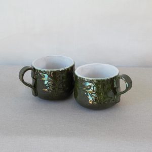 Embossed slate green pair of cups. Created by Jo Ceramics