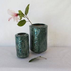 Two sizes long sizes with standout leaves. Handmade by Jo Ceramics