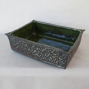 Dark green ceramic vase with glossy finish, featuring embossed rectangular pot. Handmade by Jo Ceramics